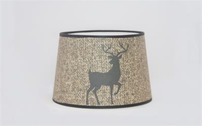 Bring a touch of rustic charm to any lamp. This new shade from Aladdin features a majestic buck deer silhouette on a warm burlap textured background. 12" base diameter, this style of Parchment (Paper) shade does not have a built-in tripod. 12" tripod/shad