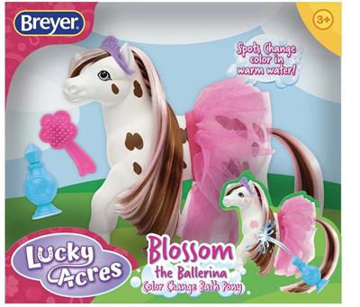 Breyer Horses Blossom the Ballerina Color Changing Appaloosa #7213 Breyer Horses Blossom the Ballerina Color Changing Appaloosa #7213 Includes: "perfume" squirt bottle, hairbrush, tutu and tiara. When this friendly Appaloosa is done pirouetting and prancing, she hops in the bath. Surprise! Her brown markings turn pink i