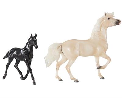 Breyer Horses Traditional Encore & Tor Mustang Set #1840 Filmmaker Ginger Kathrens has documented the mustangs of Montana’s Pryor Mountains for decades, including the palomino stallion Cloud and his family. Encore, Cloud’s look-alike daughter, was born in 2013.