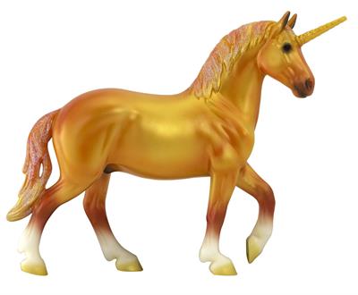 With his head held high and a determined stride, he carries the vibrant energy of the daylight down to his forest home. Solaris has a gorgeously-shaded orange and gold coat, which is perfectly accented by his glittering mane and tail. A vibrant addition t
