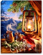 Two mugs of morning coffee sit, overlooking the Mountain sunrise (with stars still in the sky), complete with a lantern, woven blanket, log cabin window sill, pine cones and evergreen boughs, and freshly picked wildflowers. 