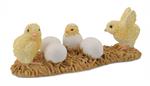 Baby Chickens on nesting straw toy figurine